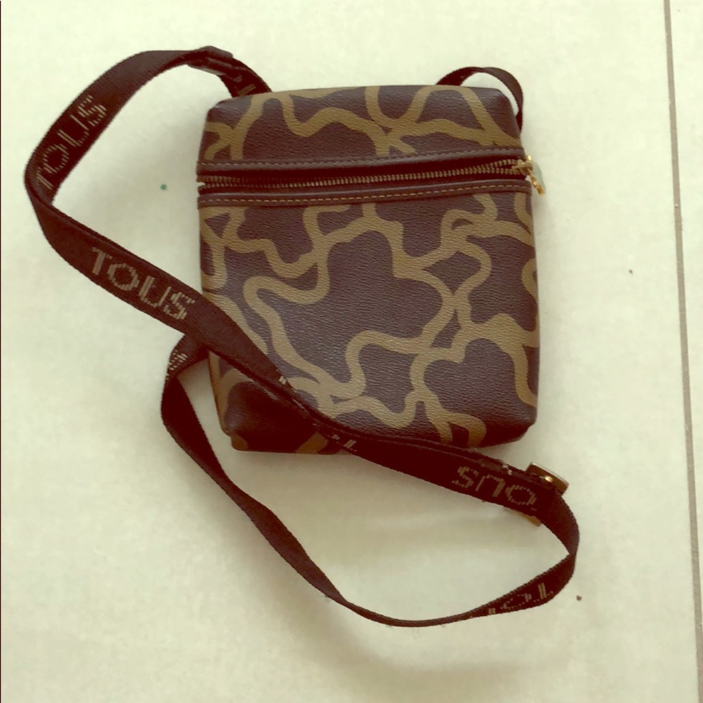 Tous cross body purse.  Great for travel!